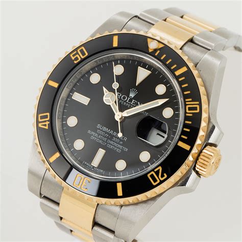 OYSTER PERPETUAL SUBMARINER SUBMARINER DATE .